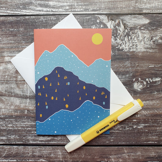 Blue Remembered Hills - Orange Sky Greeting Card